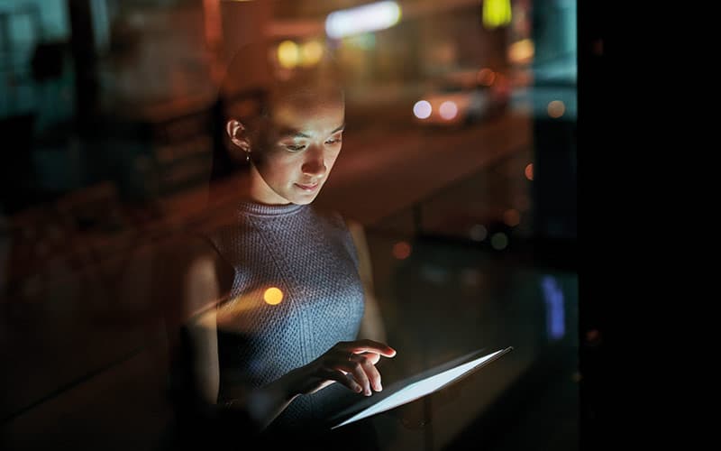 Woman using device for confidential content